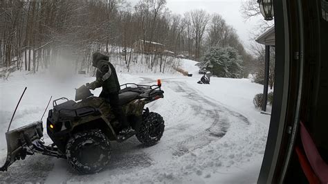 Polaris Sportsman 570 Plowing Snow - YouTube