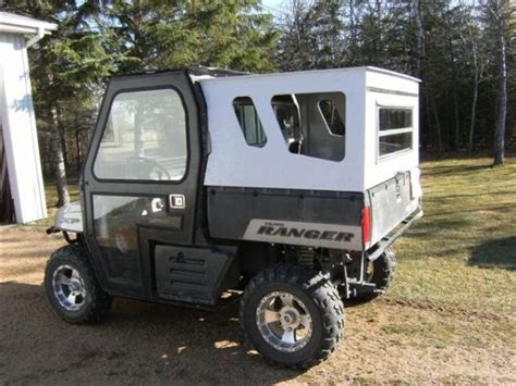 Polaris ranger camper shell. Camplite 6.8 Ultra Lightweight Aluminum UTV Camper Each CAMPLITE hard-sided UTV camper offers Aluminum and Composite construction from the aluminum floor and sidewalls to even the cabinet framing. The exterior is painted aluminum skin, and the walls and roof are vacuum-bond laminated for superior strength. Unlike other campers, the CAMPLITE UTV ... 