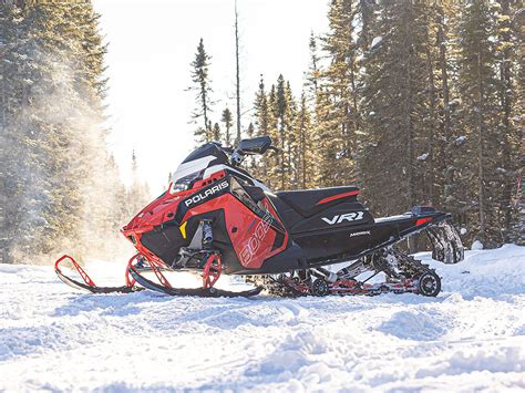 The Ultimate Sport-Utility Snowmobile. 55