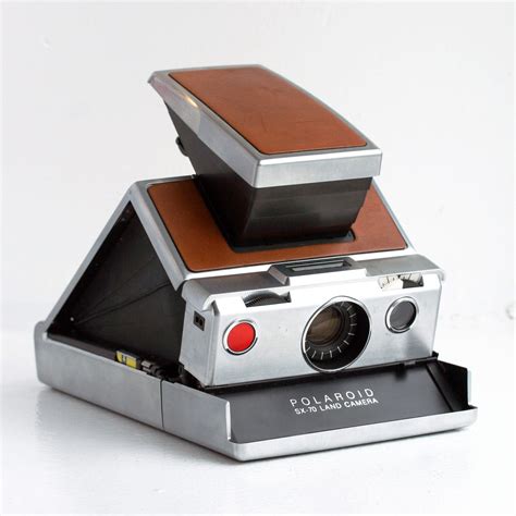 Polaroid sx 70 land camera manual. - Plan de marketing, el - 3b.