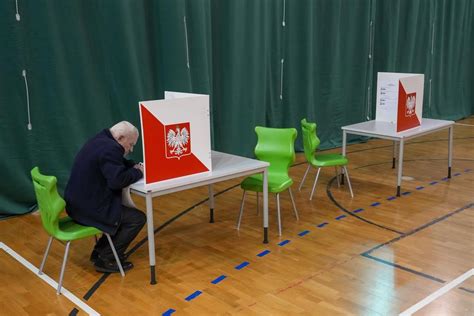 Poles vote in a high-stakes election that will determine whether right-wing party stays in power