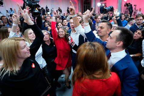 Poles vote in huge numbers for centrist opposition after 8 years of nationalist rule