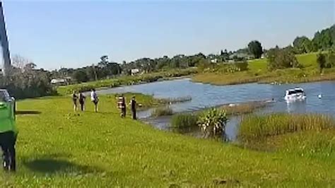 Police, good Samaritan rescue elderly man from sinking car in alligator-infested pond