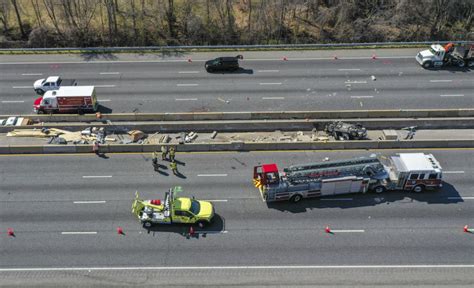 Police: Driver veered into highway work zone, killing 6