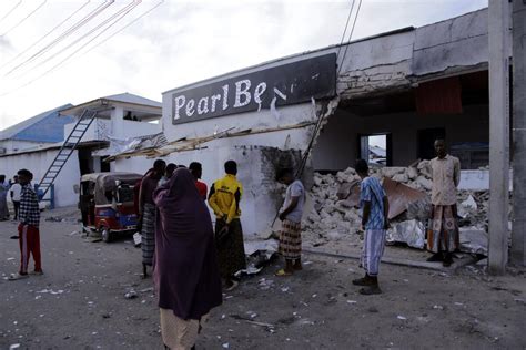 Police in Somalia say nine killed in extremist attack on beachside hotel in Mogadishu