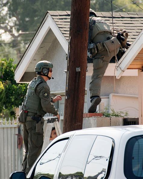 Police in hours-long standoff with armed man in Orange County