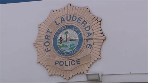 Police investigate body found floating in canal behind apartment complex in Fort Lauderdale