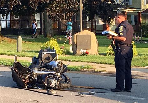 Police investigating motorcycle crash on Washington Street in Boston