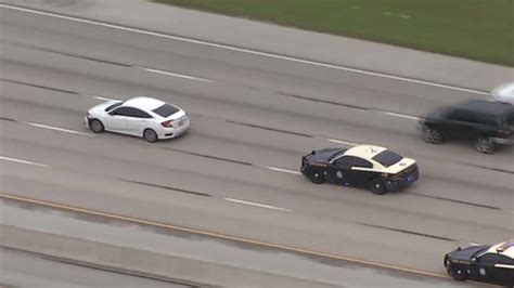 Police pursuit ends on freeway after crash