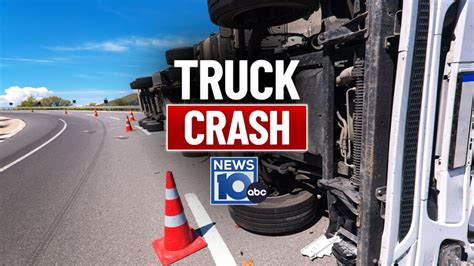 Police respond to overturned tractor trailer in Colonie