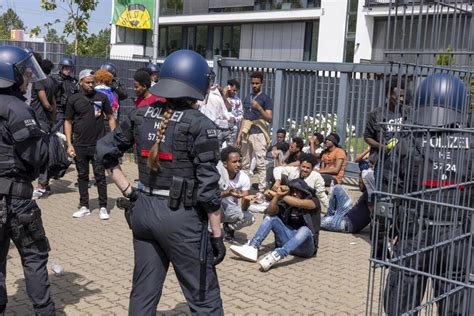 Police say 22 officers have been injured during unrest at Eritrean festival in Germany