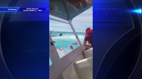 Police say a US tourist died when a catamaran carrying more than 100 people sank in the Bahamas