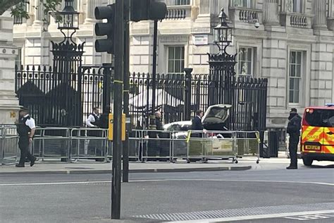 Police say car collides with gates of Downing Street, where UK prime minister lives