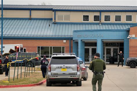 Police say multiple people have been shot at a high school in Perry, Iowa; suspect is dead