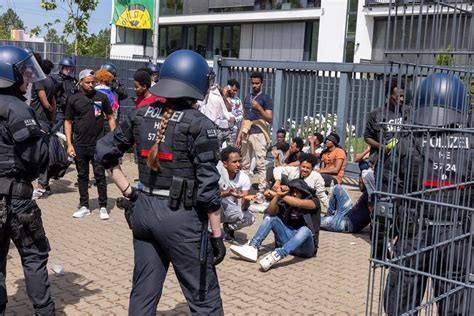Police say several officers injured during unrest at Eritrean festival in western Germany