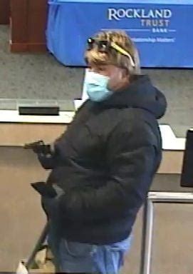 Police searching for man who robbed Falmouth bank at gunpoint