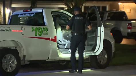 Police set up perimeter surrounding U-Haul truck with stolen packages