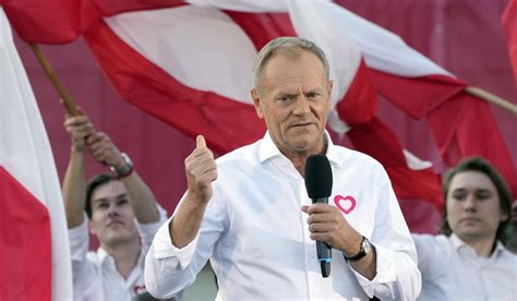 Polish opposition leader Donald Tusk says change ‘is inevitable’ as election supporters rally