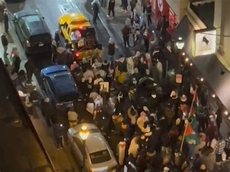 Politicians condemn protest at Jewish-owned business as police monitor demonstrations