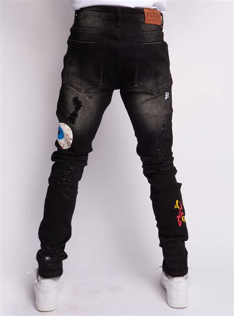 Politics jeans. These super stacked heavy distressed jeans feature a unique horizontal fray design. These jeans are crafted from high-quality materials that are designed to stand up to even the toughest wear and tear. In eight unique and vibrant colorways, these jeans are sure to make a bold statement wherever you go. 