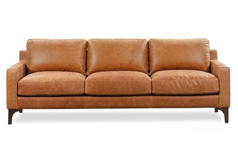 Poly and bark leather sofa. This cognac tan Nolita sofa seats 3 and comes with leather finish has a slight nod to mid-century modern design. Order now for free shipping! ... Poly & Bark Trade. 1 ... 
