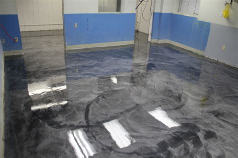Polyaspartic floor coating. Any moisture content in the concrete floor won’t affect it color or shine. Contains zero to minimal volatile organic compounds (VOC), making it safe for humans and the environment. Work with the best concrete contractor in town! Call us at (786) 899-2146 for more info on Polyurea Polyaspartic coatings garage floor installation process & costs. 
