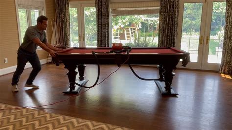 Pool table move. Disassemble a 3 piece slate pool table and move it to storage $275; Disassemble a 3 piece slate pool table $200. Take out side to storage or movers add $30; Pick up pool table from storage, deliver and install it $325; Move a pool table for reflooring. 3 piece slate. Requires two trips, 1st trip is $225, 2nd trip is $275 