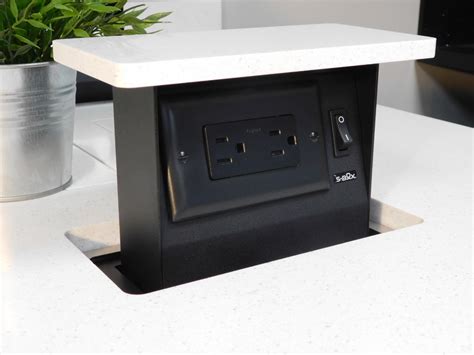 Pop up outlets. The Wiremold DQFP20UBK by Legrand is a kitchen power pop up with a beautiful black powder coat finish designed to be concealed and flush mounted in countertops. When you push the button 2 power and 2 charging USB pop up, when you are done simply press the top till it latches shut. The power outlets are 20A and tamper proof, the USB charging ... 