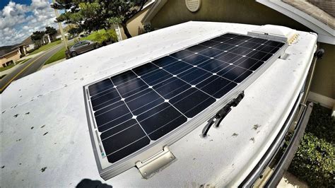 Installing the solar panels is done by using Unistrut cone connectors - 1/4-inch or 3/8-inch - to attach to the slotted steel L brackets. Both cone connector sizes are available at big box hardware stores. It would be safer to have someone help you to lift the solar panels up and onto the truck camper's roof.. 