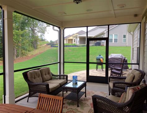 Porch windows with screens. Install aluminum window screens from inside the home by opening the window fully, placing the top of the screen in the top screen channel, pulling up on the tabs and lowering the b... 