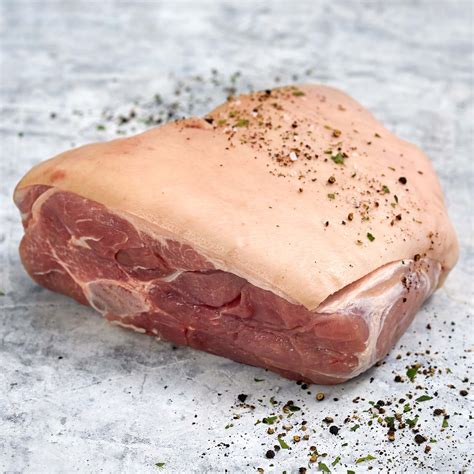 Pork picnic shoulder. Into a large roasting pan, add pork, skin side up. Cover with aluminum foil and bake for 5-7 hours. Remove foil and raise heat to 350 degrees for twenty minutes. Remove from heat, let rest for ten minutes. Sprinkle lime juice before serving, if desired. 