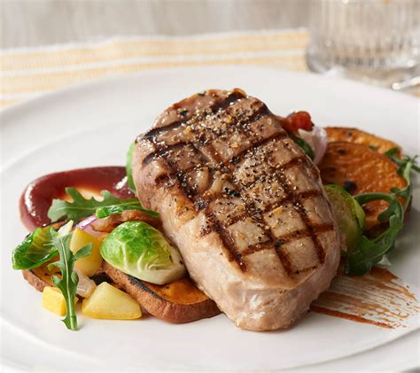 Pork ribeye steak. Pork is higher in Vitamin B1, Selenium, Phosphorus, Choline, and Vitamin D, however, Rib eye steak is richer in Vitamin B12, Zinc, and Iron. Daily need coverage for Vitamin B1 from Pork is 67% higher. Pork contains 8 times more Vitamin D than Rib eye steak. While Pork contains 53IU of Vitamin D, Rib eye steak contains … 