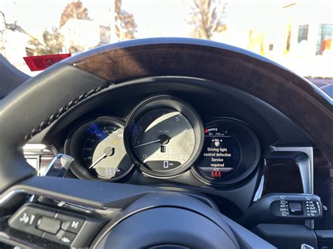 Porsche macan driving light control defective.  I assume Headlight-control software in the ...