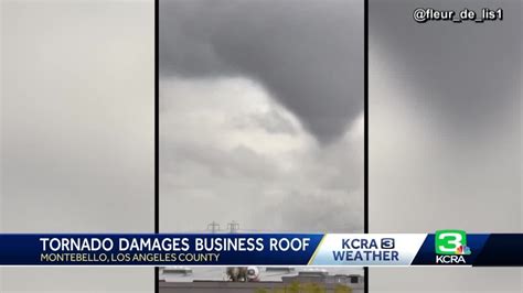 Possible tornado near Los Angeles rips up building roofs