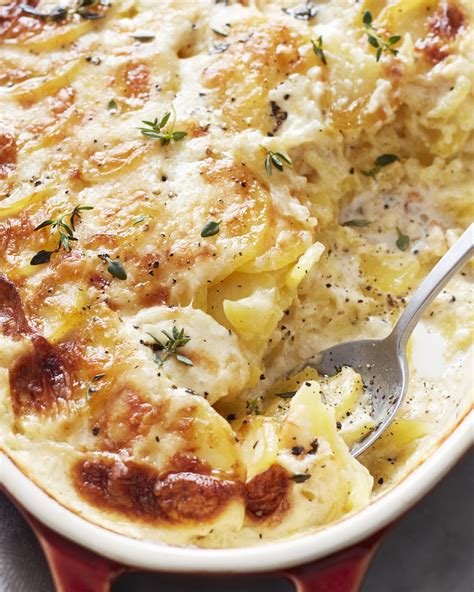 Potato dauphinoise. Preheat the oven to 350°F (180°C). In a large saucepan, combine the crushed garlic, double cream, and milk. Heat gently until hot but not boiling. This will infuse the cream mixture with garlic flavor, and help the potatoes cook faster in the oven. Season the cream mixture with salt and pepper to taste. 