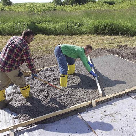 Pouring a concrete slab. Build temporary forms from scrap lumber nailed securely to stakes. Make sure the top edges of the forms are level to expedite finishing the concrete later. Pour the gravel bed. Reinforce the area as required by code (typically with 1/2-inch reinforcing bar around the perimeter and 6-inch-square N. 10-10 welded-wire mesh within the slab area). 