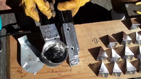 Pouring some lead fishing weights - YouTube