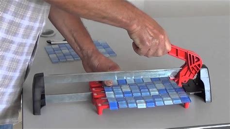 By applying pressure to a small amount of tile at the edge you create a fracture along the surface. How the top edge of the nippers lines up with the tile will determine the direction of the cut. Angle the nipper to go in the direction you want the cut. For a straight cut align the top edge of the nippers parallel with the top edge of the tile..