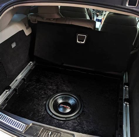 Powered subwoofers that fit into spare tire? - Cadillac Owners Forum