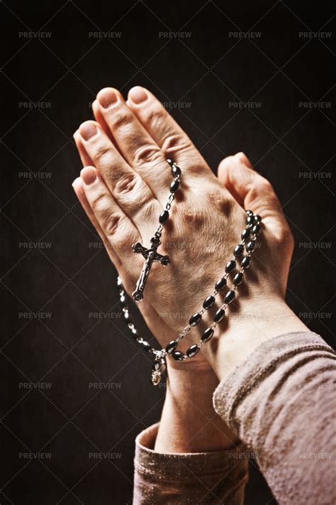 Praying The Rosary Pictures, Images and Stock Photos