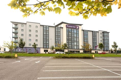 Premier inn dublin airport hotel dublin. Chargeable on-site parking is available at €10.00 per day. Parking is for hotel guests on the night of your stay only, there is no long stay parking available at this hotel. Dublin Airport Premier Inn operate a shuttle bus service every half hour between the airport and the hotel from 4.15am to 11pm. The bus leaves from the airport coach park ... 