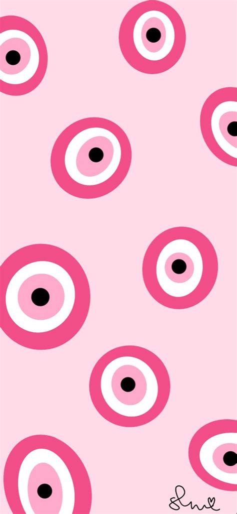 Preppy pink evil eye wallpaper. The blue evil eye beads underwent a widespread circulation in the region, being used by the Phoenicians, Assyrians, Greeks, Romans and, perhaps most famously, the Ottomans. Though their usage was ... 