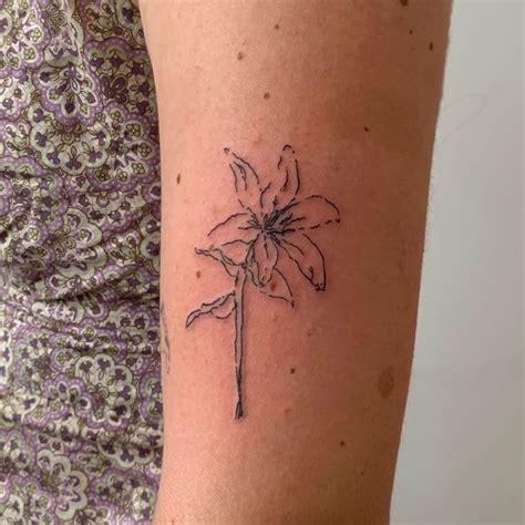 Prettydelfiblueflowerstattoos.jpg