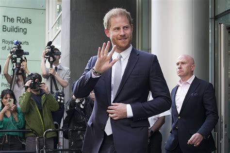 Prince Harry claims vindication in court victory as judge finds British tabloid hacked his phone