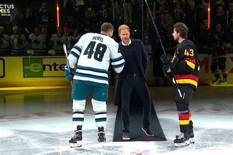 Prince Harry drops the ceremonial puck during NHL game