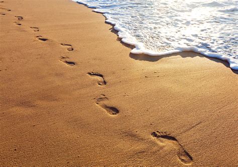 Footprints in the Sand, a beautiful poem! One night I dreamed a dream. As I was walking along the beach with my Lord. Across the dark sky flashed scenes from my life. One belonging to me and one to my Lord. I looked back at the footprints in the sand. there was only one set of footprints.. 