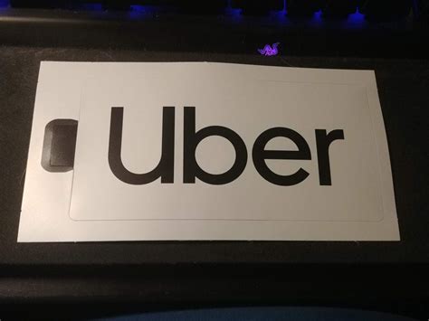 Official Uber stickers don't stick after a while. Just find a big visible Uber logo, print a small size and use an adhesive clear cd jackets to hold them in. I find cleaning the uber sticker adhesive strip with a bit of warm water and soap, then letting it dry, does wonders. I've been using the same one for months now. . 