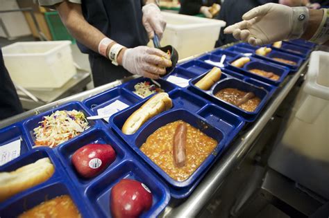 Prison meals. Meals Supplied by the Federal Bureau of Prisons: The Chow Hall Most general population BOP facilities serve three meals a day in a dedicated cafeteria-type area (the “chow hall” in prison lingo). Most chow halls offer fixed tables, usually with four to six stools bolted thereto. 