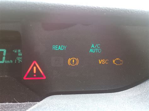 The Toyota Prius red triangle warning light is a dashboard in