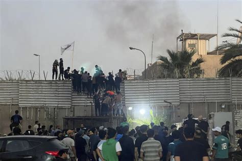Protesters briefly storm the Swedish Embassy in Baghdad in protest over Quran burning